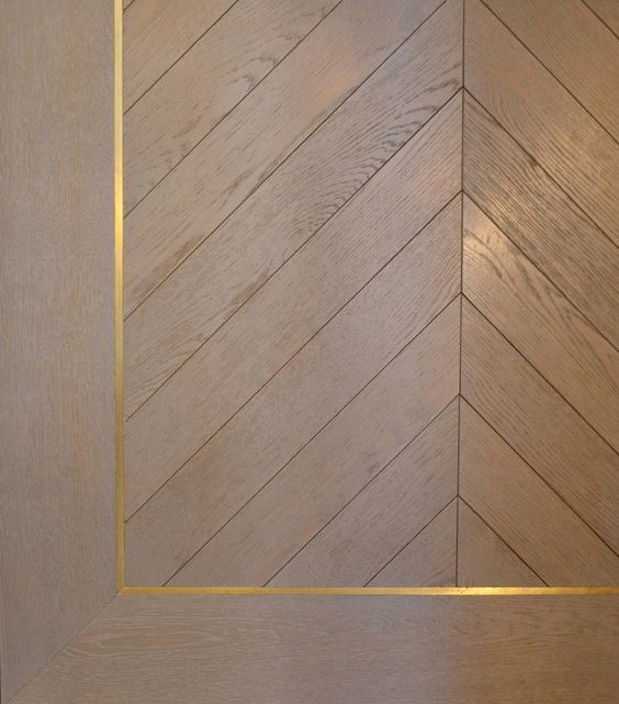 A guide to different parquet styles and other gorgeous wood flooring ideas - brass inlay flooring